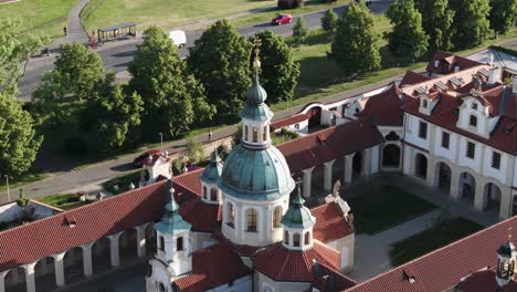 Drone-Shot-of-Church-of-Our-Lady-Victorious,-Bílá-Hora,-Prague,-Monumental-Religious-Landmark-and-Sanctuary