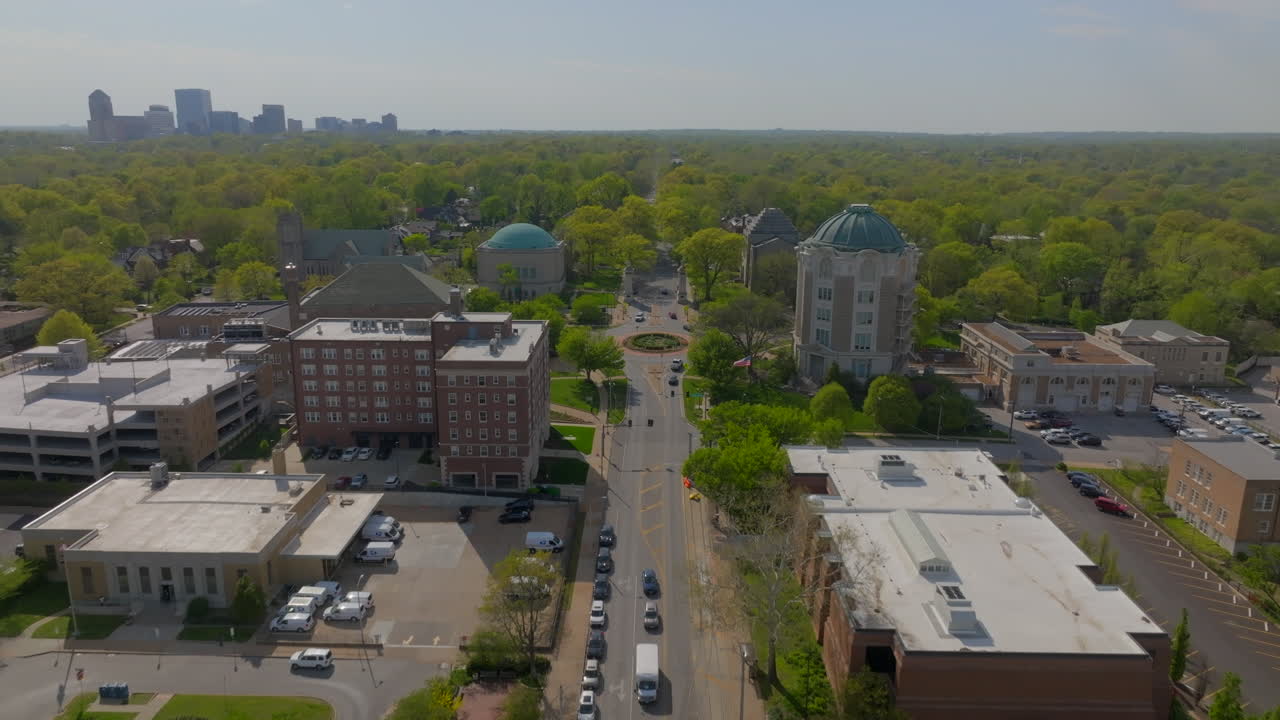 Flyover Delmar in University City towards and past City Hall on a pretty spring day