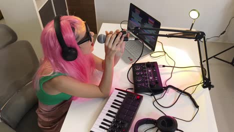 woman recording music in a home studio