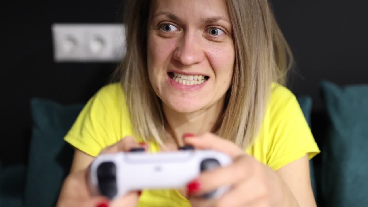 Woman's emotional reactions while playing video games
