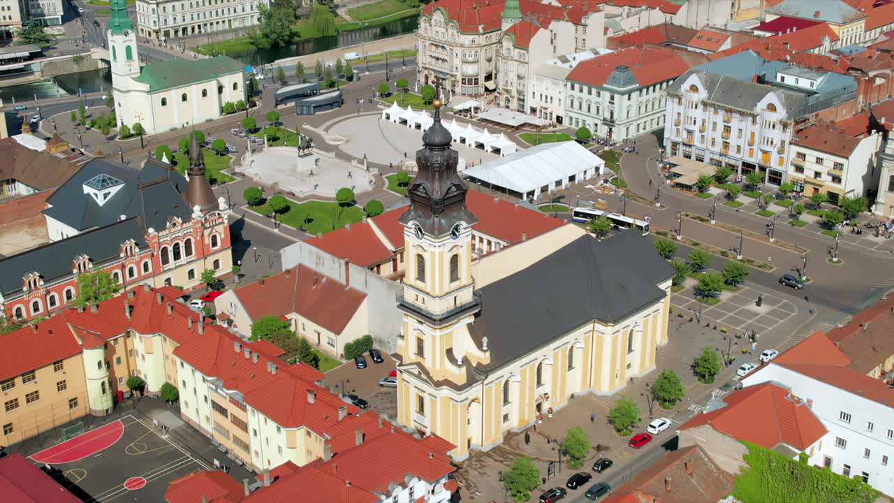Areal drone view of the Cathedral of St. Nicholas in Oradea downtown, Romania. Unirii Square on the background