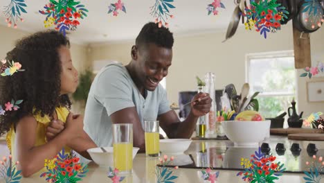Animation-of-flowers-over-happy-african-american-father-and-daughter-eating-breakfast-at-home