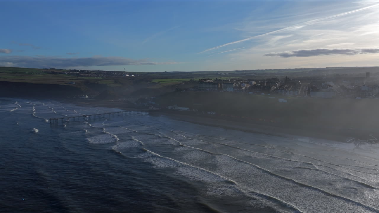 Wide Angle Aerial Drone Shot of Saltburn-by-the-Sea and Pier at High Tide