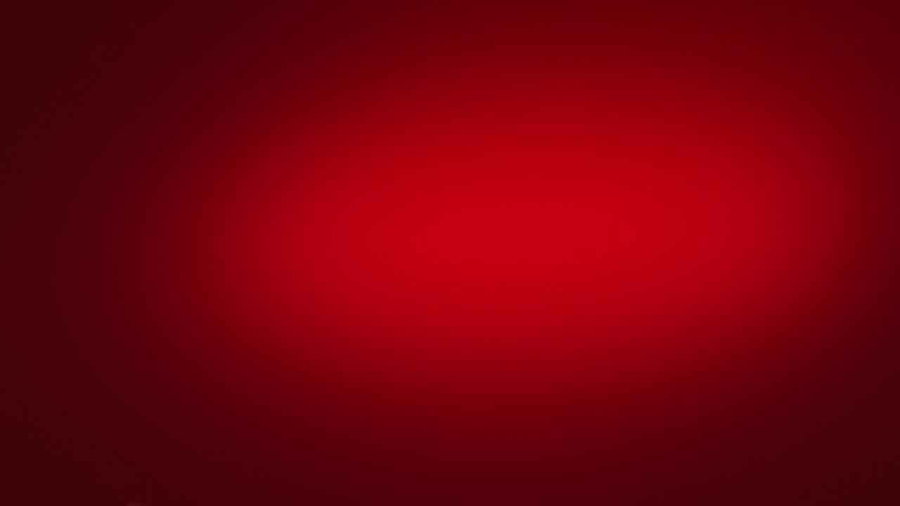 Avocado e fette volanti su sfondo rosso intenso