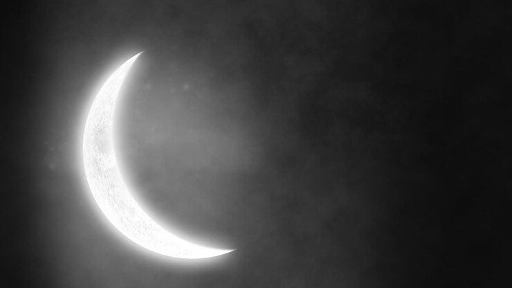 Moon and clouds of smoke