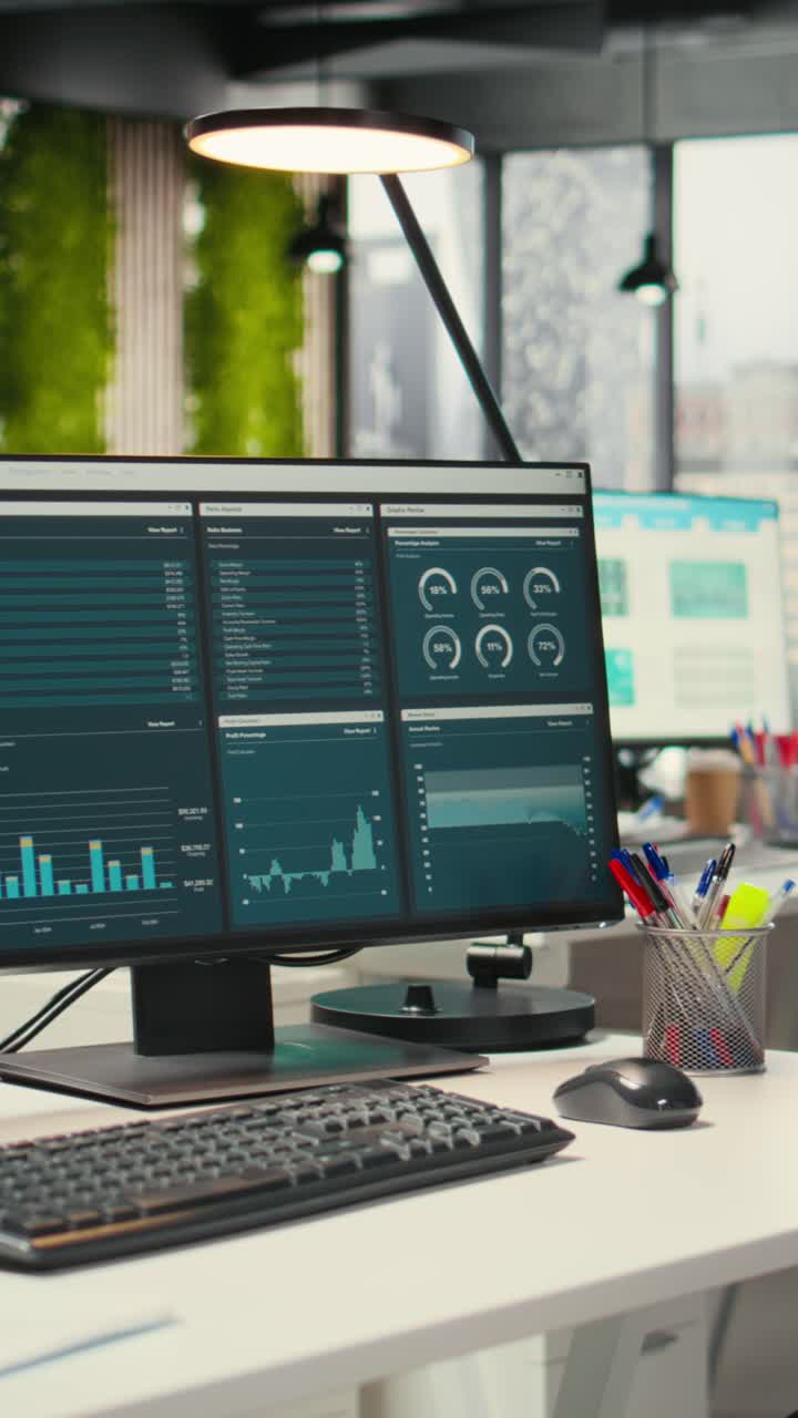 Vertical Video Empty business office is equipped with resources and dual monitors