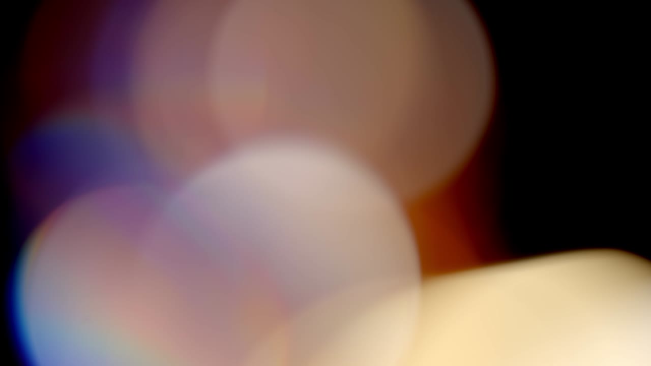 imágenes de fugas de luz multicolor sobre fondo negro, transiciones de superposiciones de fugas de destellos de lente