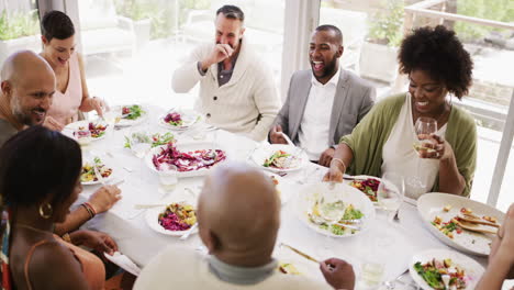 diverse group of best friends eating