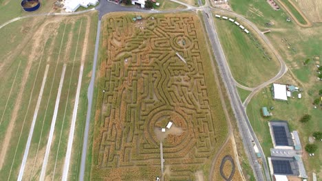 aerial view from above of a large corn maze in autumn as seen by a drone