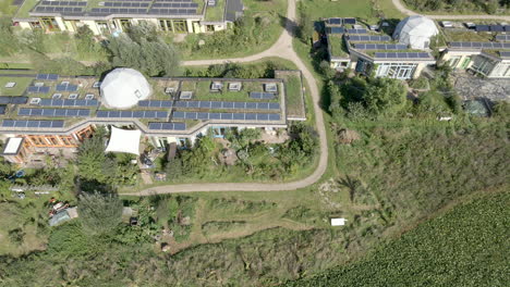 aerial dolly of beautiful earthship homes