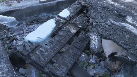 Burnt-pallet-after-Moria-Refugee-Camp-Fire-Lesvos,-Greece