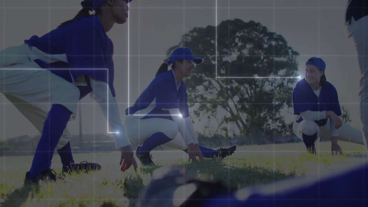Grid animation over athletes stretching on grassy field