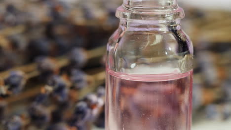 lavender essential oil in a glass bottle