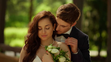 loving couple posing in garden