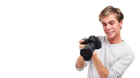 attractive photographer man taking photographs