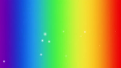 animation of white spots moving over rainbow background