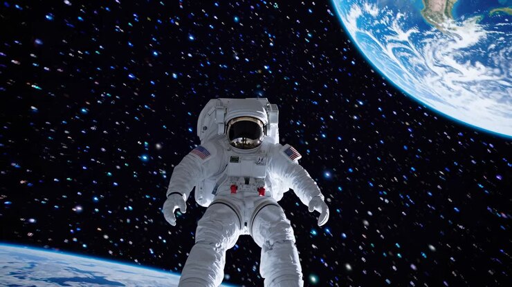 A lone astronaut floats in a starry galaxy, captured from a wide-angle view