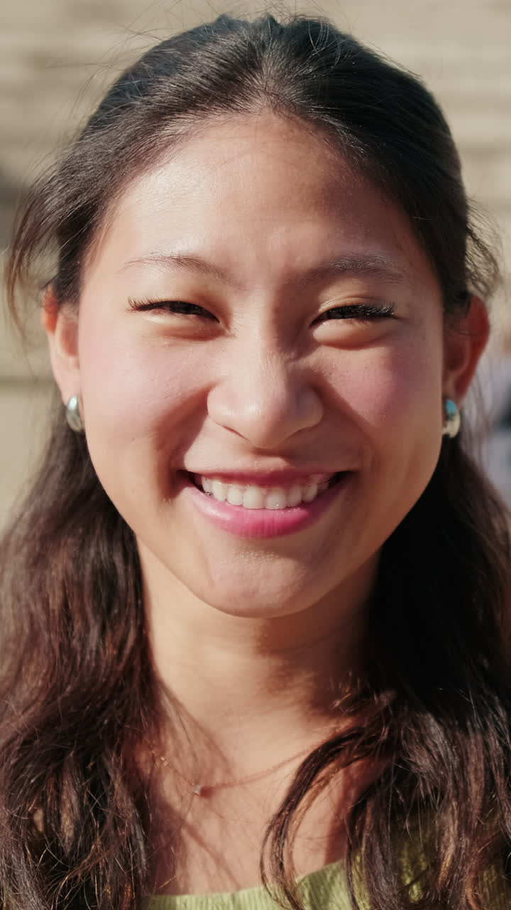 Close up of Asian girl with a notebook, cute girl in the school with her friends