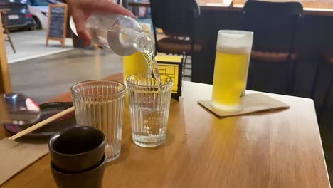 beverages being served at a dining table