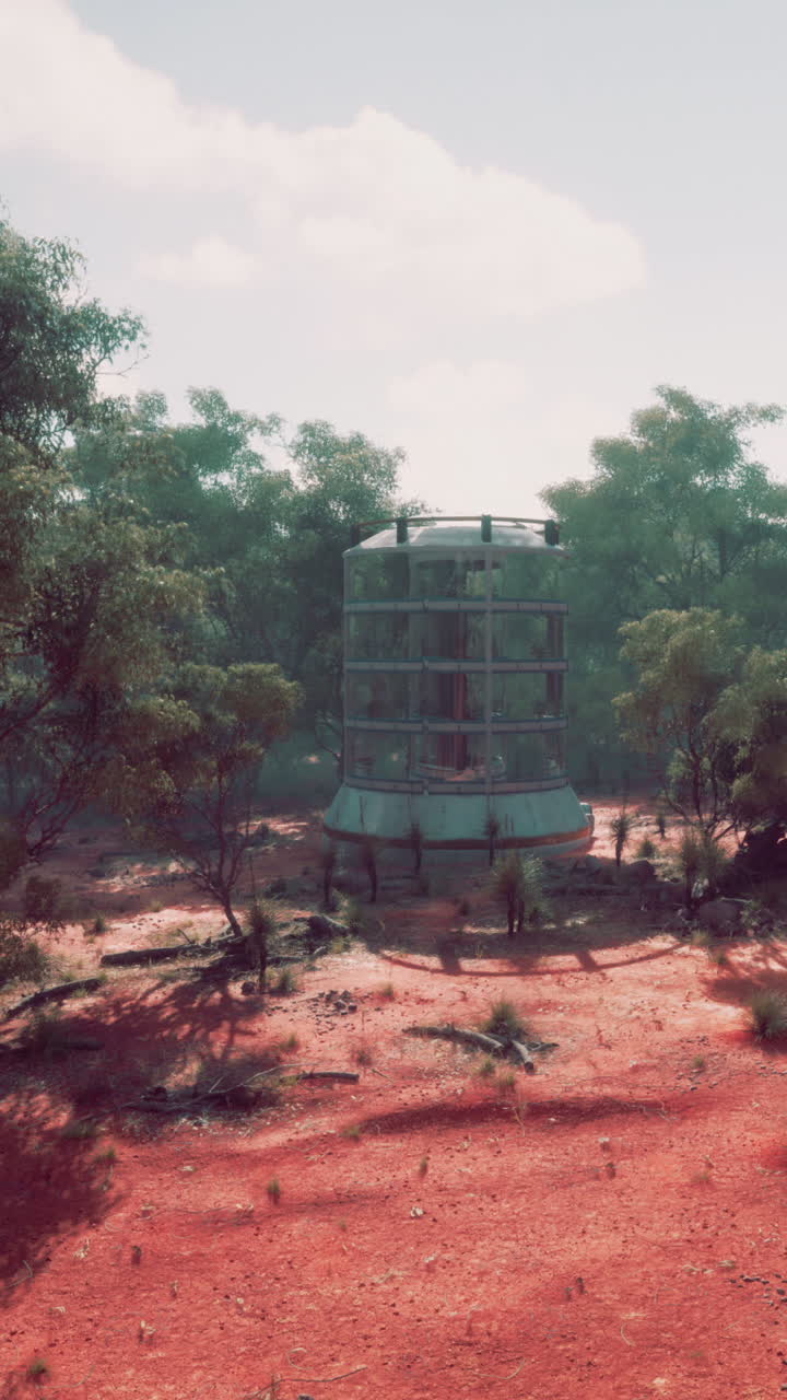 un edificio de vidrio futurista en un paisaje desértico