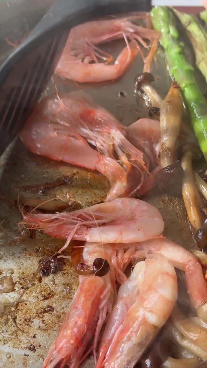 Cooking Shrimp, Mushrooms, and Asparagus in a Hot Pan