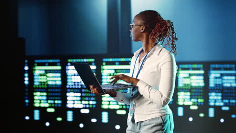 executive strolls through data center