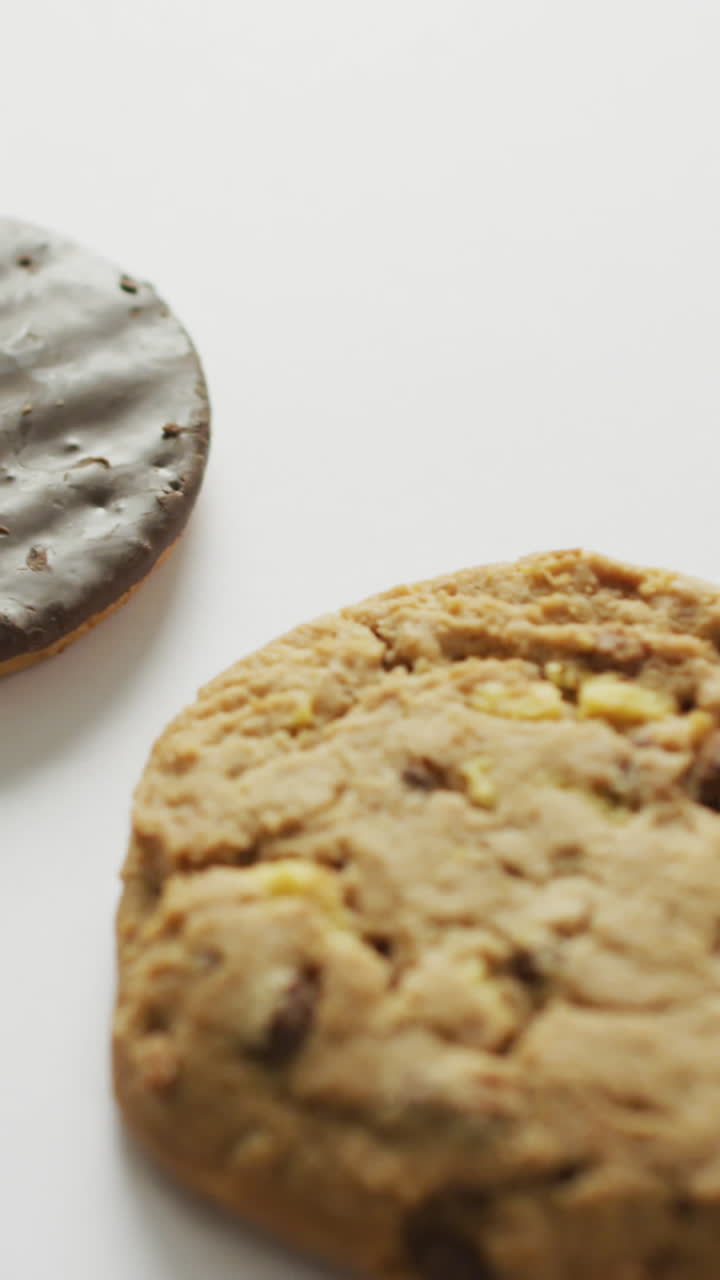 Video of biscuits with chocolate over white background