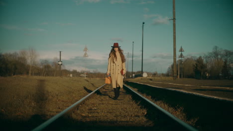 woman walking on tracks