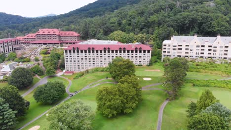 4k drone video of convention center and golf course at grove park inn in asheville, nc on sunny summer day-5