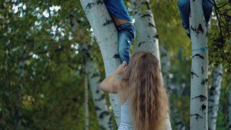young beautiful mother helps a child