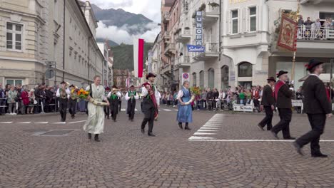 the music band of the city of meran marches during the grape festival in meran - merano, south tyrol, italy (part 1 of 2)