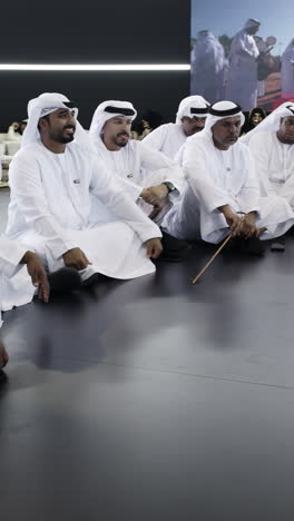 emirati men in traditional attire