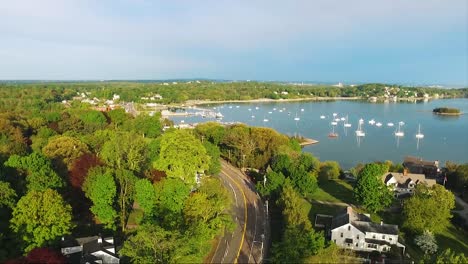 amazing vibrant drone footage of hingham harbor, a seaside community, during a sunny summer morning