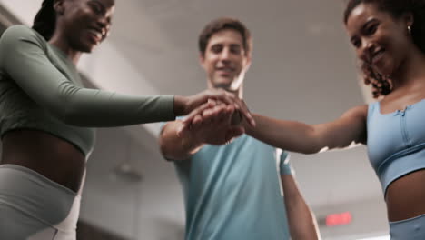group of people in a gym celebrating together