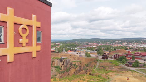 iconic copper symbol on falu red tower at falun copper mine in dalarna sweden