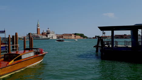 venice, maritime landscape, boats, slow motion, boat passing from left to right to right, frame rate: 30