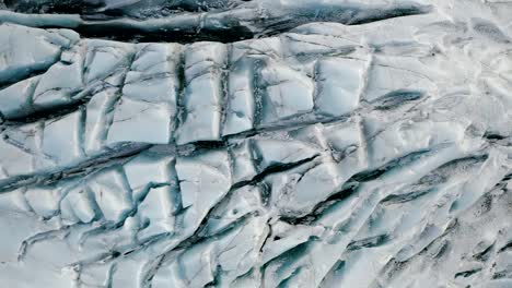 Aerial-Detail-of-Glacier-Surface-Topography-with-Ice-Cracks-and-Chasms