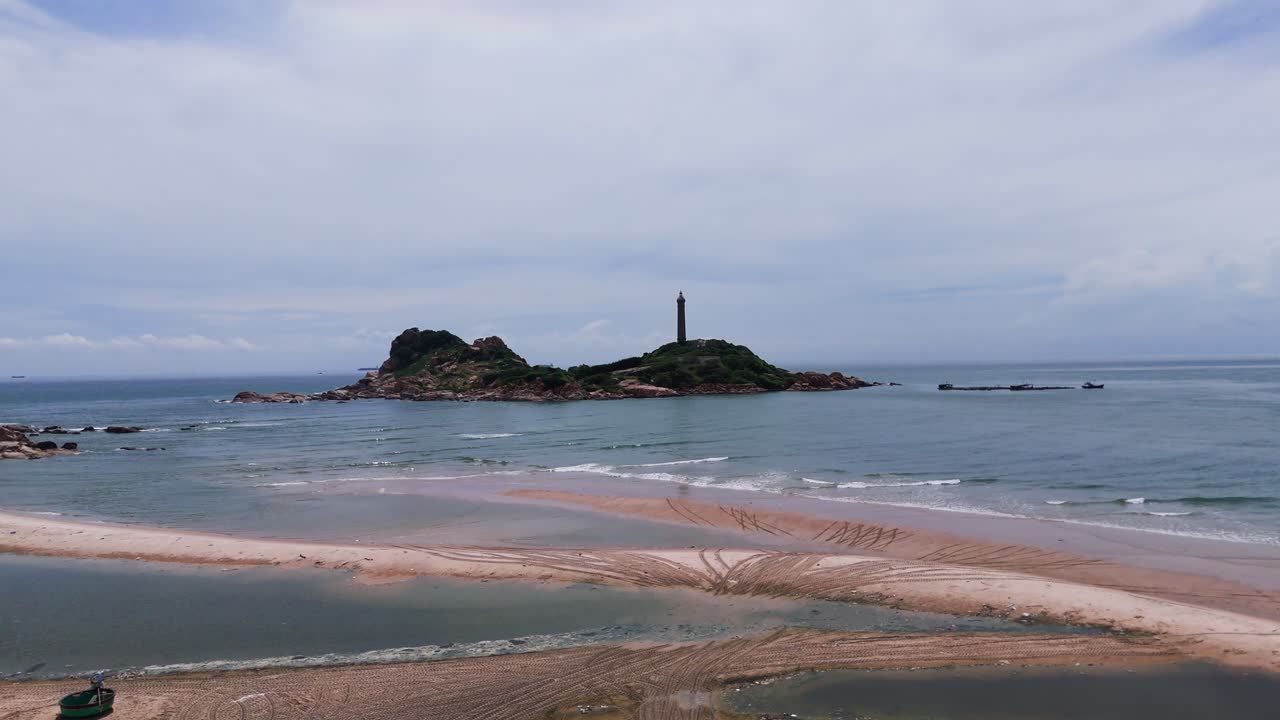 Aerial View Tilt of the Famous KE GA Cape From the Beach in Binh Thuan (Vietnam) During the Rainy Season