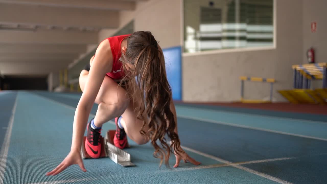 Track and Field Athlete at Starting Blocks