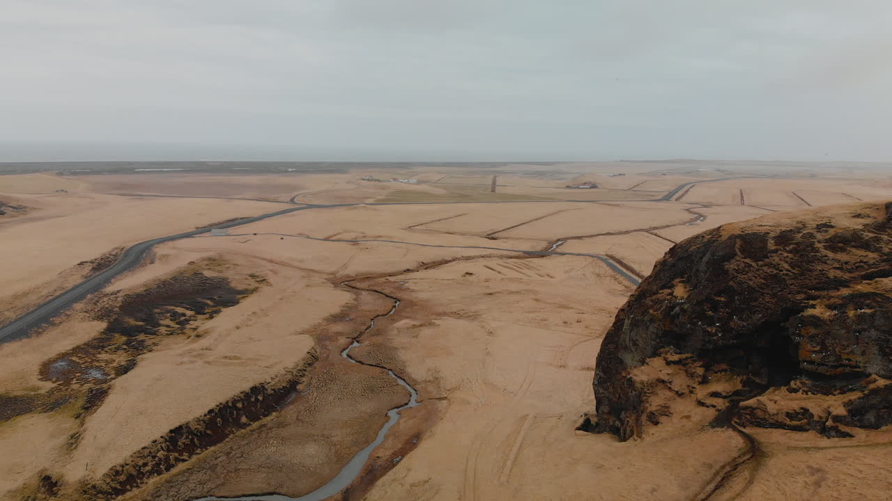 Icelandic Highland Landscape with Cliff and Road