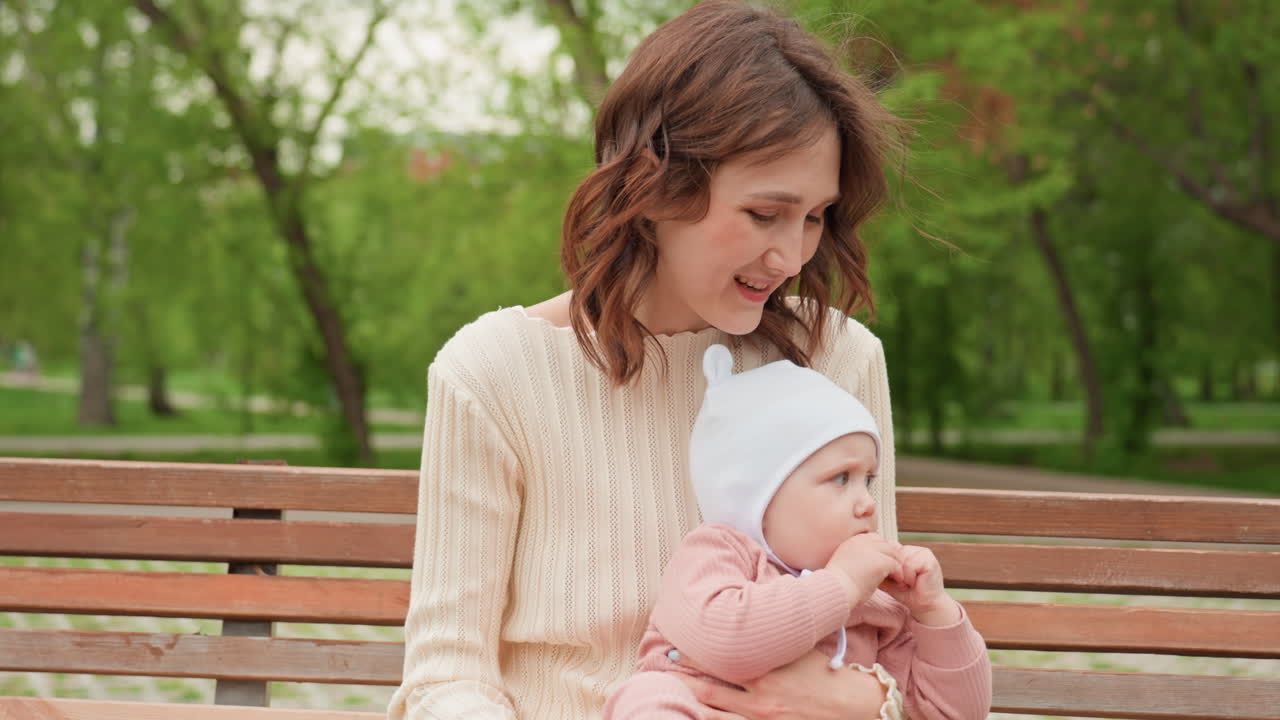 Joyful Park Bonding, Mother And Child Sharing Happiness, Warmhearted Scene Of Mother Embracing Child Outdoors, Caucasian Mother And Baby Experiencing Joyful Outdoor Moment Together