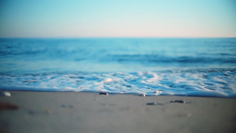 calm relaxing ocean waves at a sandy beach