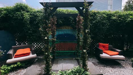 charming backyard patio with wooden archway