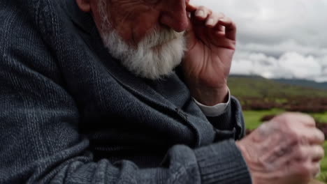 elderly man in scottish highlands