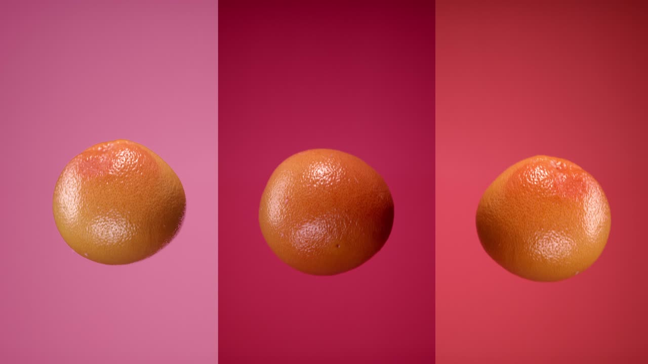 pomelas frescas lanzadas volando colgando en el aire y cayendo