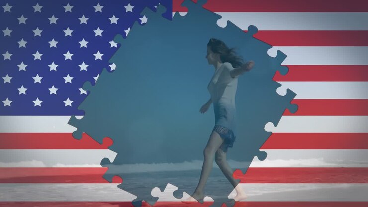Animation of American flag waving with jigsaw puzzles revealing woman dancing on beach
