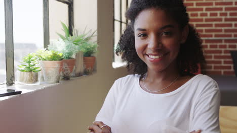 Black-woman,-relax-and-confident-smile-with-arms