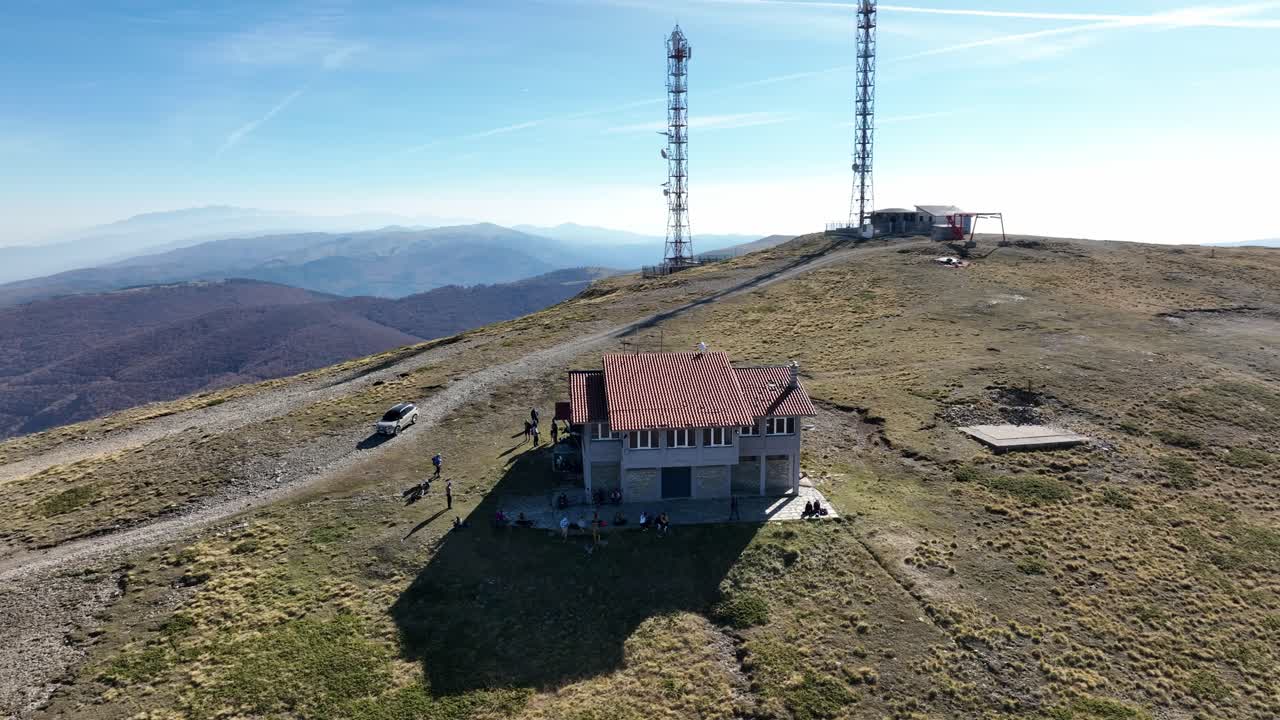 Rotation of the Shelter on Mount Vermio and communication antennas in the background. Mountain range in northern Greece