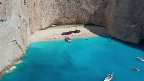 idyllic view of beautiful navagio beach on zakynthos island in greece - aerial drone shot