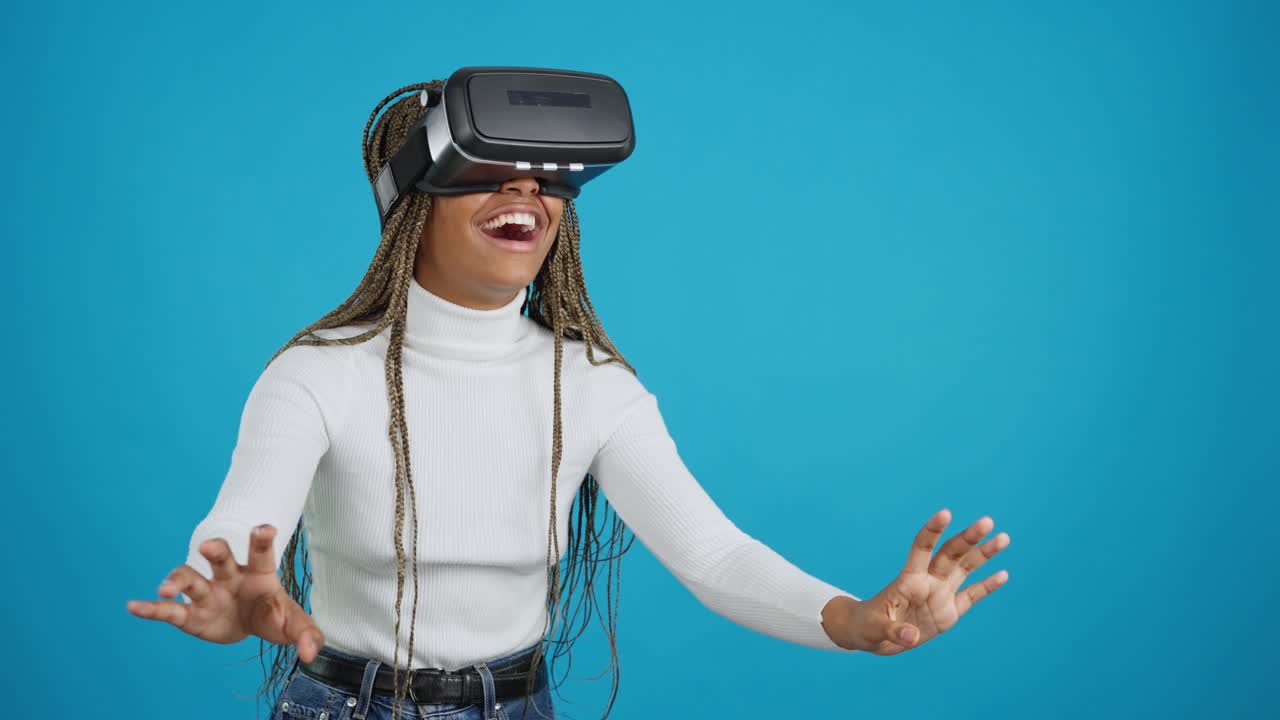 Excited Woman Experiencing Virtual Reality with VR Headset